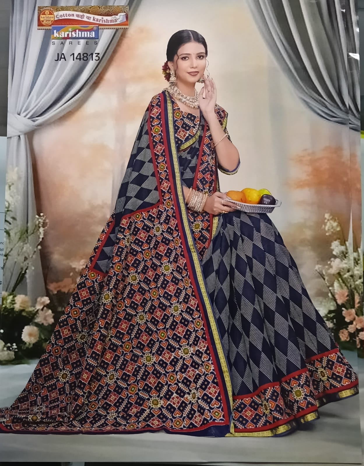 A beautiful 100% pure malai (Soft) cotton saree featuring elegant traditional prints and a soft, fluid drape perfect for festive occasions.