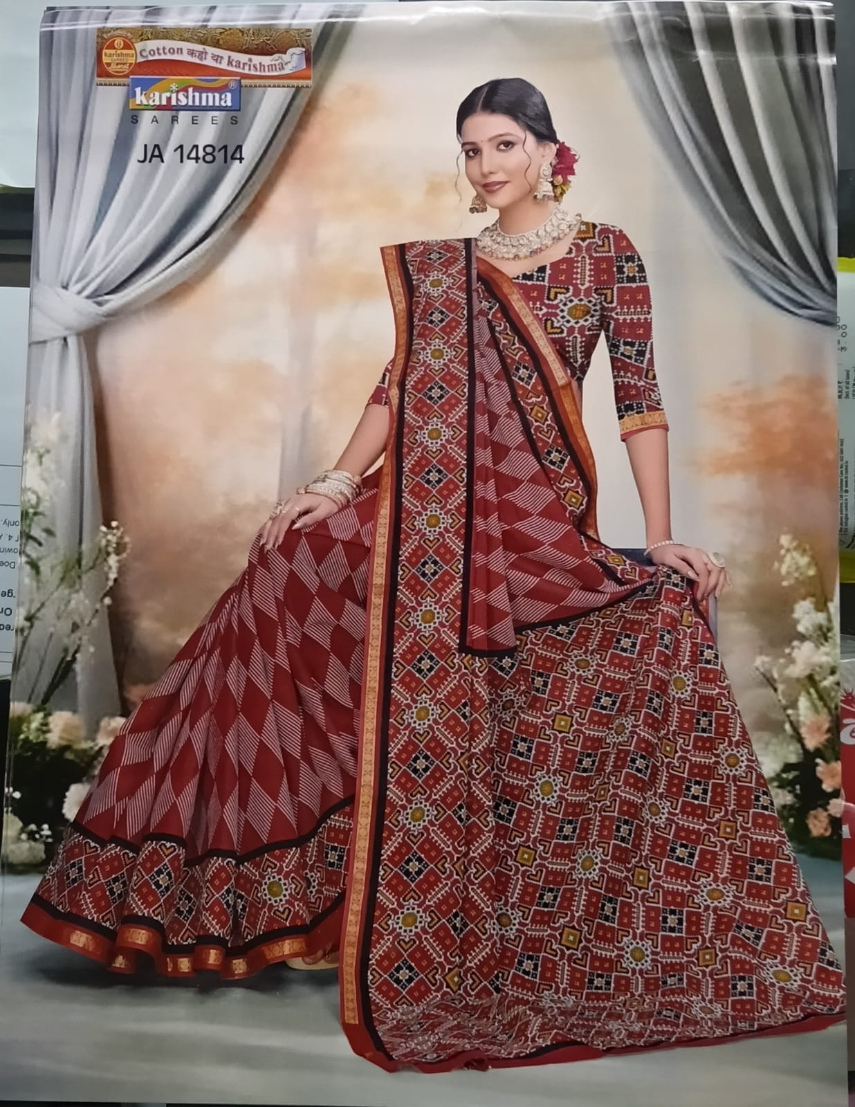 A beautiful 100% pure malai (Soft) cotton saree featuring elegant traditional prints and a soft, fluid drape perfect for festive occasions.