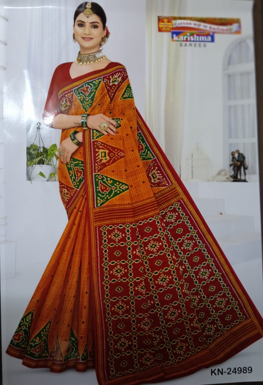Experience the lightweight grace of our Konark Kota pure cotton mulmul (Stiff) saree, featuring traditional geometric prints in warm festive tones.
