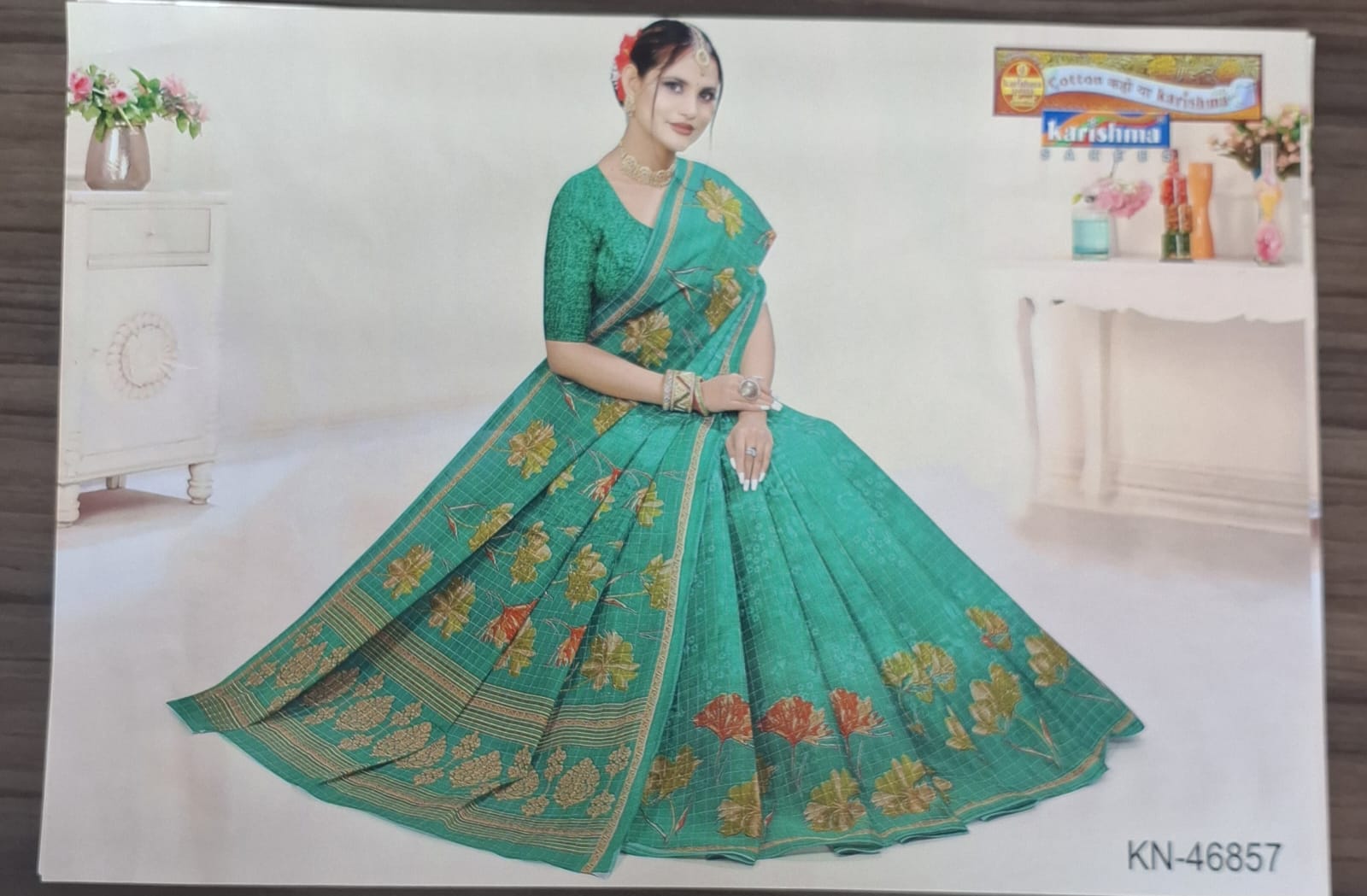 Experience the effortless drape of pure mulmul (stiff) cotton with this beautifully printed saree, perfect for festive gatherings and elegant daily wear.