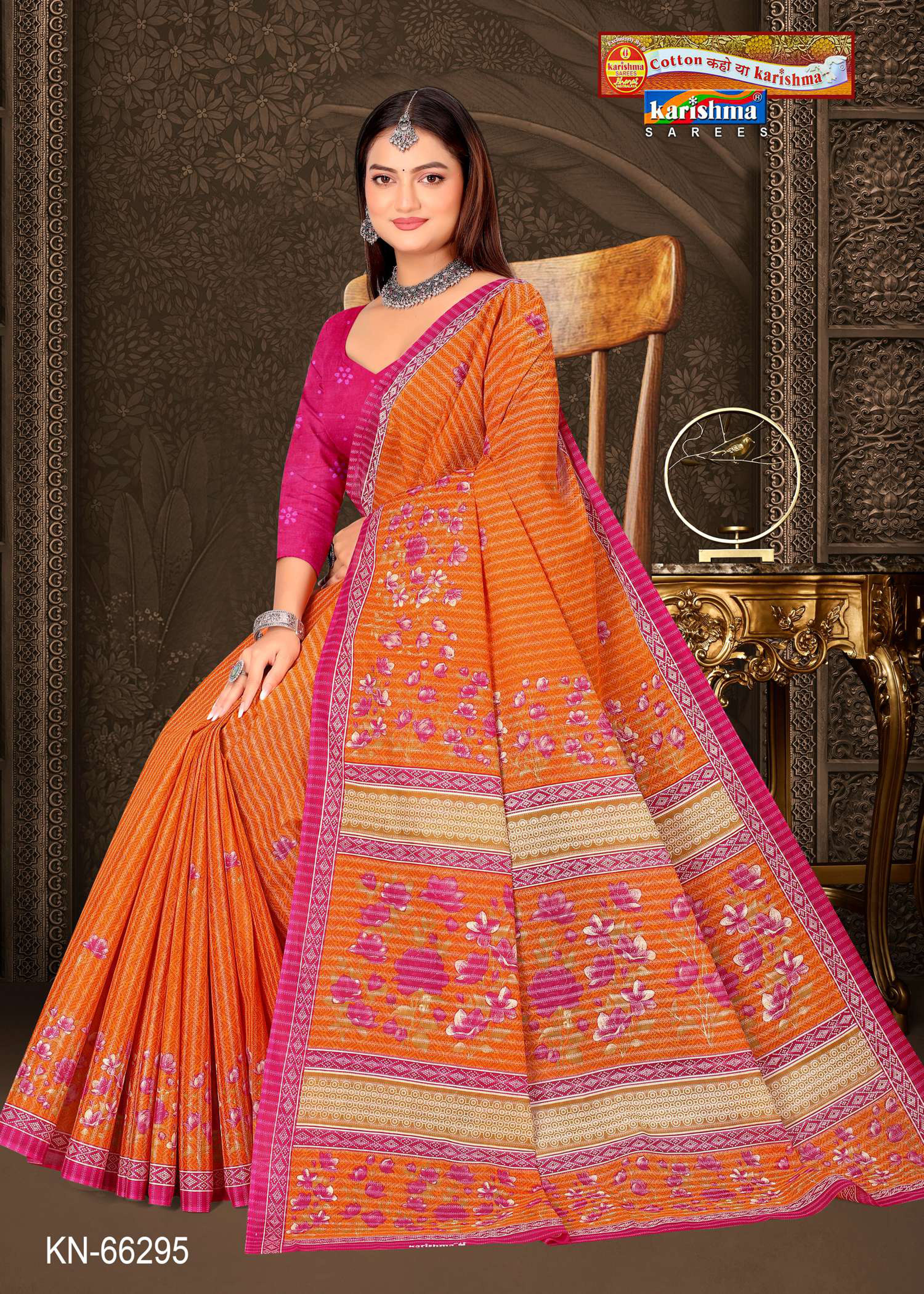 Orange Pure Cotton Mulmul (Stiff) Saree With Floral Print And Small Border.