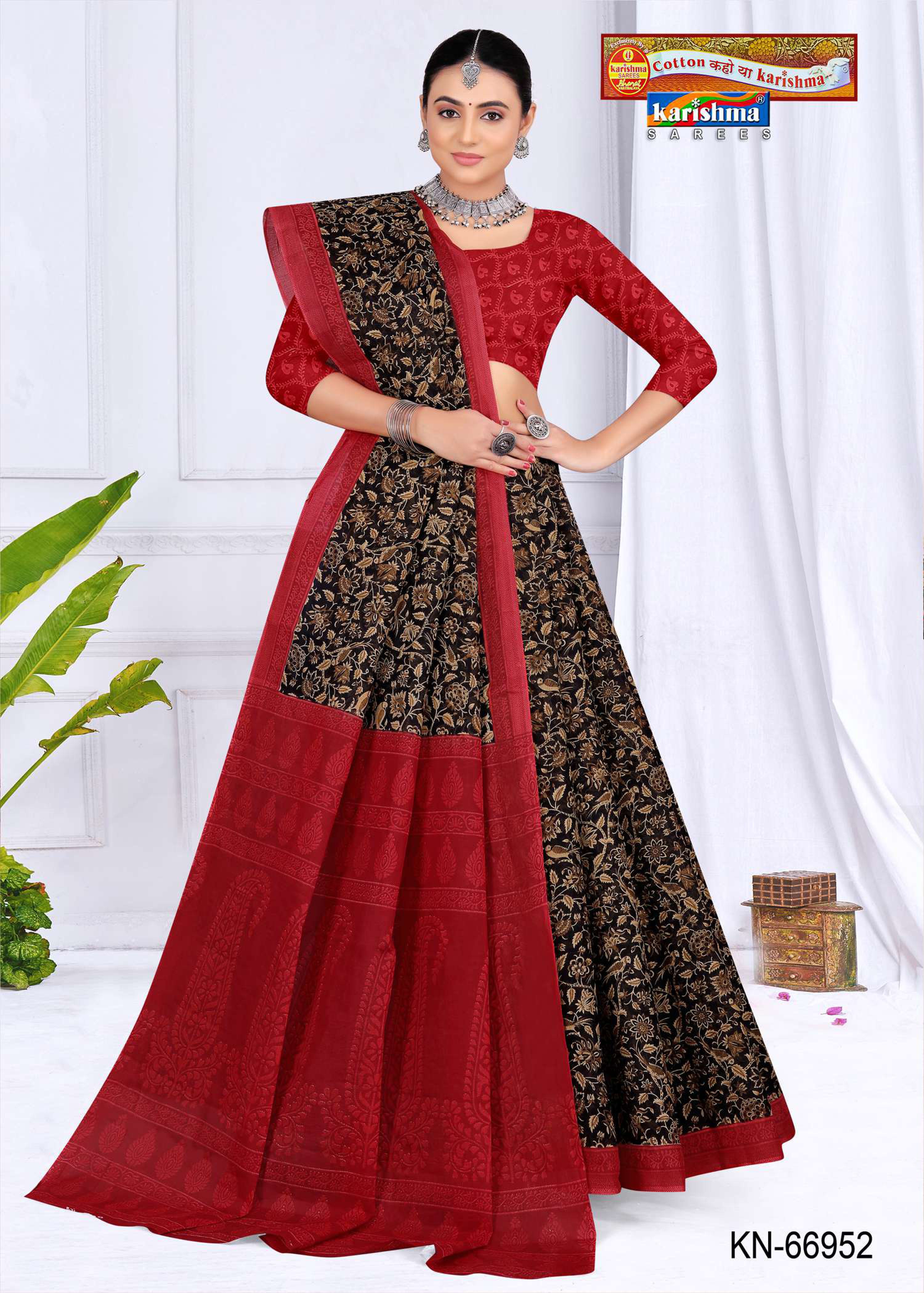 Black Pure Cotton Mulmul (Stiff) Saree With Nature Inspired Print And Simple Border