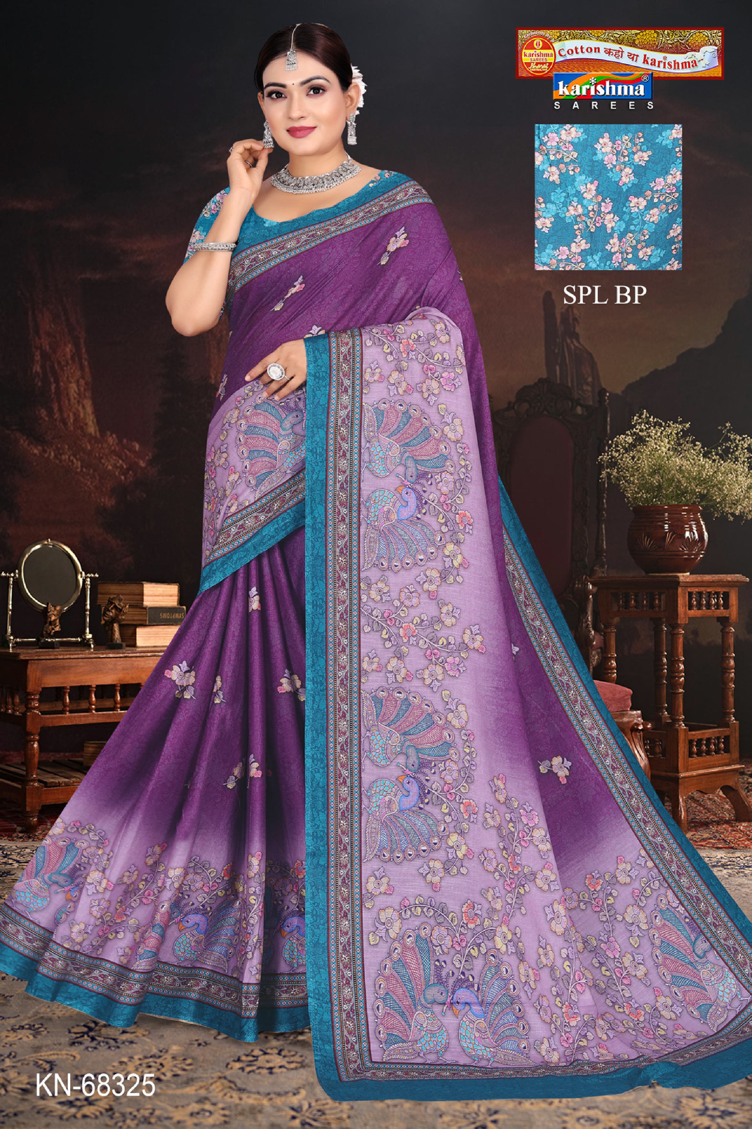 A beautifully draped pure malai cotton saree featuring elegant Tanchoi-inspired peacock motifs, perfect for festive gatherings and family celebrations.
