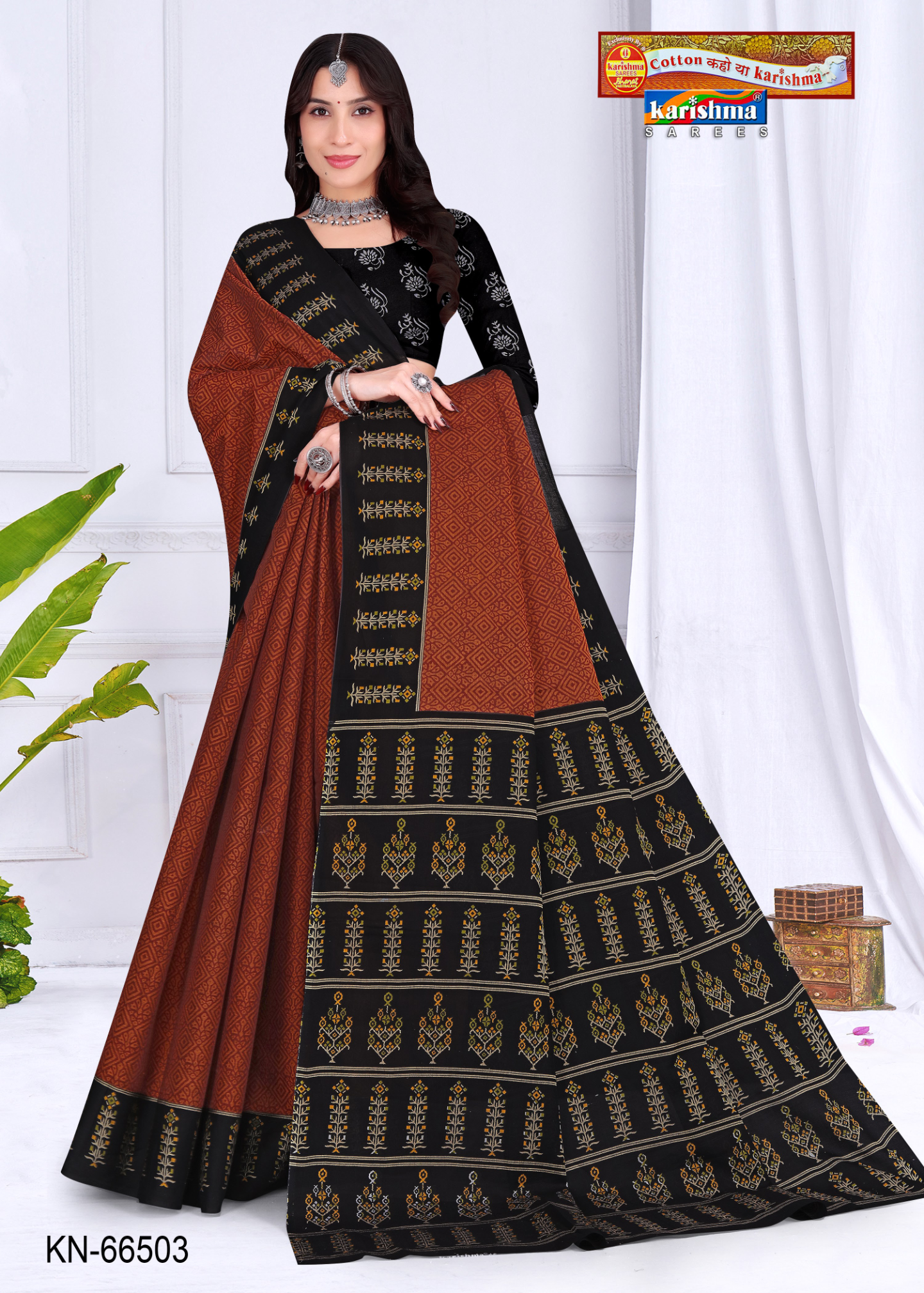 Rust Orange & Black muslin saree